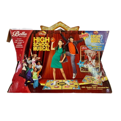 164 - High School Musical dolls etc in boxes. Largest box 46x28cm