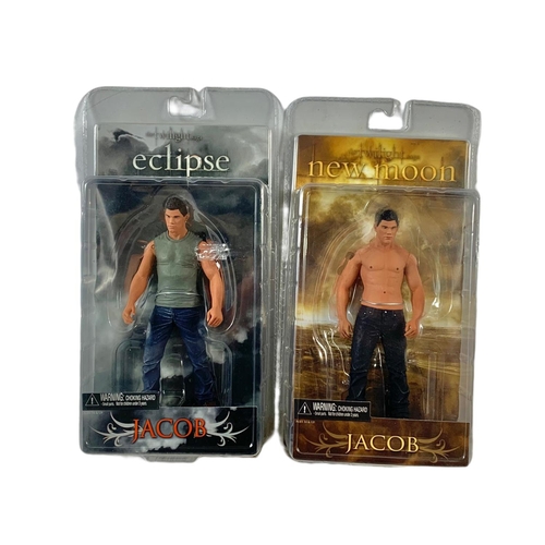 165 - 6 Twilight action figures in boxes. “Jacob x2, Edward & Bella x2, Jasper, Edward” boxes measure 17x2... 