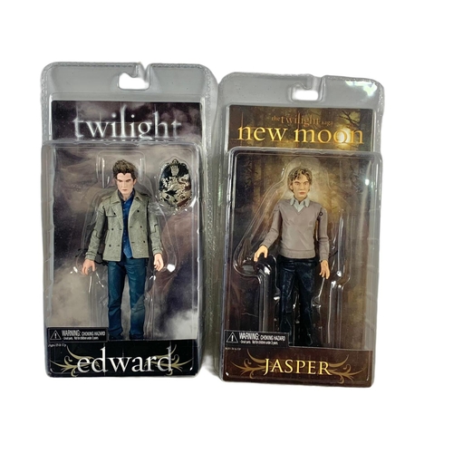 165 - 6 Twilight action figures in boxes. “Jacob x2, Edward & Bella x2, Jasper, Edward” boxes measure 17x2... 