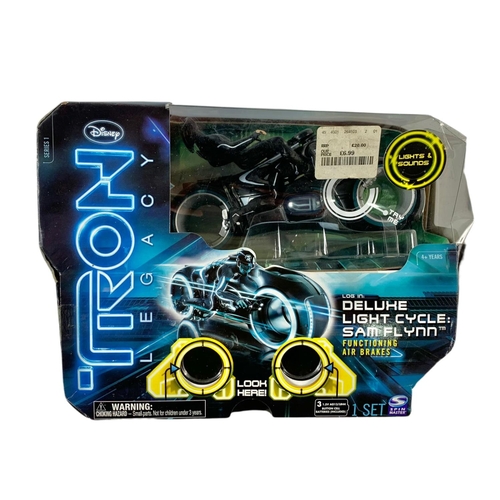 170 - 3 Disney Tron Legacy action figures in boxes. “Deluxe Light Cycle Sam Flynn, Deluxe Light Cycle Clu,... 