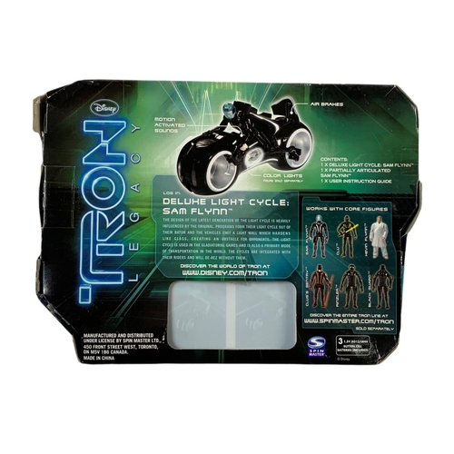 170 - 3 Disney Tron Legacy action figures in boxes. “Deluxe Light Cycle Sam Flynn, Deluxe Light Cycle Clu,... 