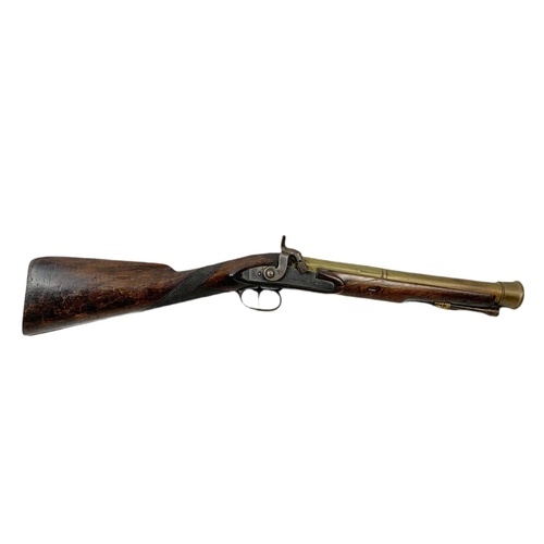 178 - English brass-barrelled blunderbuss by T. Bolton & Co London. 67cm.