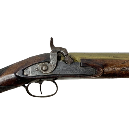 178 - English brass-barrelled blunderbuss by T. Bolton & Co London. 67cm.