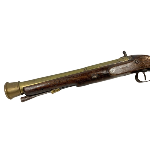 178 - English brass-barrelled blunderbuss by T. Bolton & Co London. 67cm.