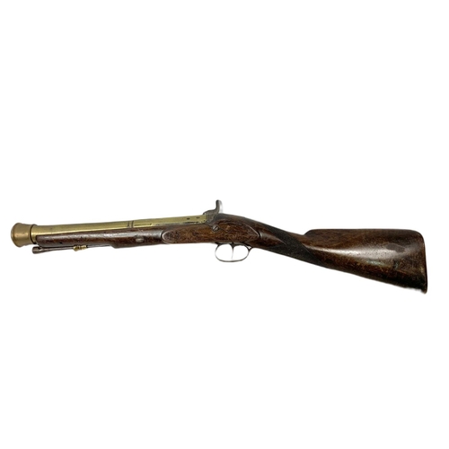 178 - English brass-barrelled blunderbuss by T. Bolton & Co London. 67cm.