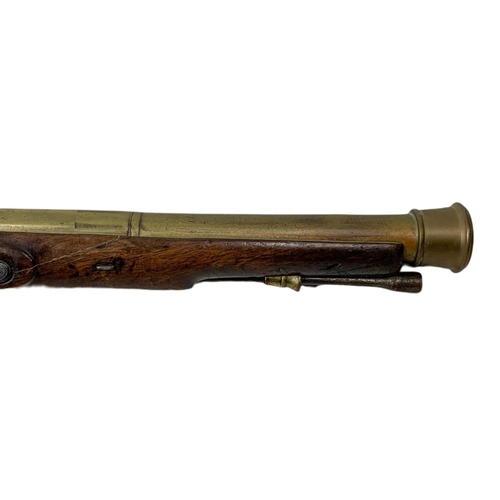 178 - English brass-barrelled blunderbuss by T. Bolton & Co London. 67cm.