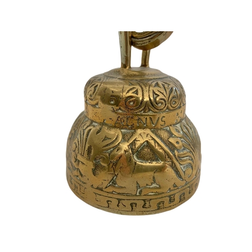 183 - Brass wall hanging bell. 25cm