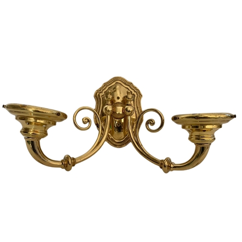 194 - Pair of heavy brass wall lights. 43/28cm