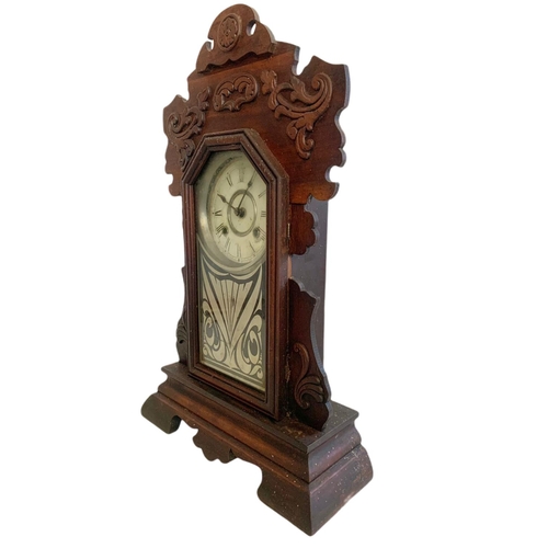 209 - Victorian gingerbread clock. With key and pendulum. 36/13/59cm