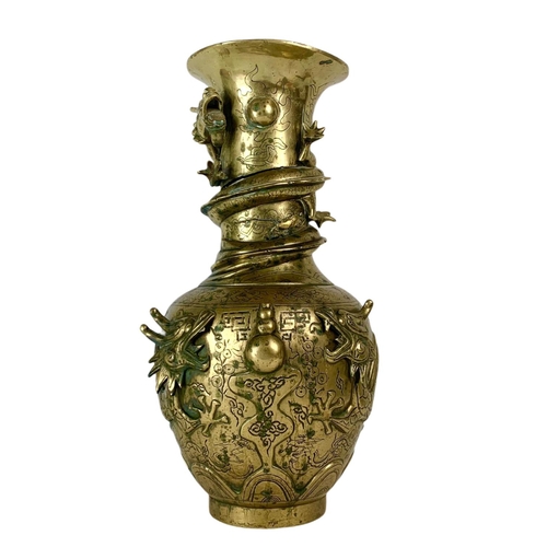 21 - Late 19th century ornate heavy brass Chinese vase. 42.5cm