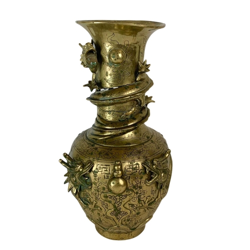 21 - Late 19th century ornate heavy brass Chinese vase. 42.5cm