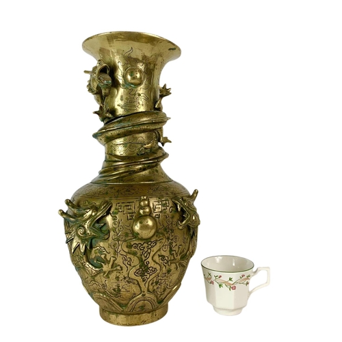 21 - Late 19th century ornate heavy brass Chinese vase. 42.5cm