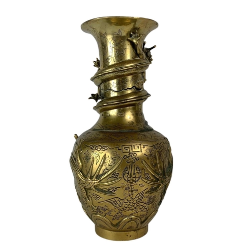 21 - Late 19th century ornate heavy brass Chinese vase. 42.5cm