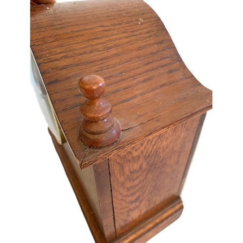 210 - Edwardian inlaid oak mantle clock. 30/13.5/29.5cm