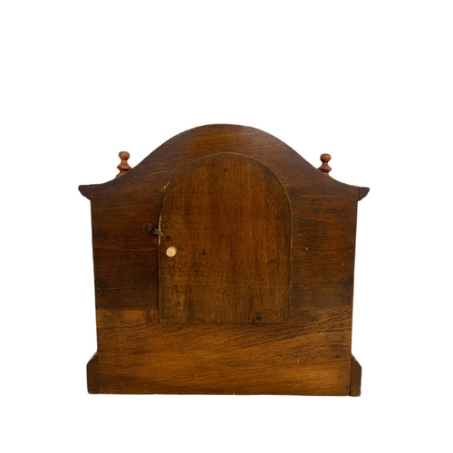 210 - Edwardian inlaid oak mantle clock. 30/13.5/29.5cm