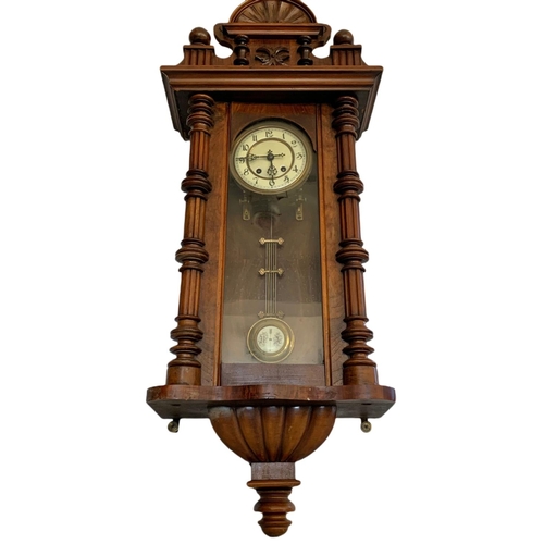 218 - Victorian Vienna wall clock with pendulum. 96cm