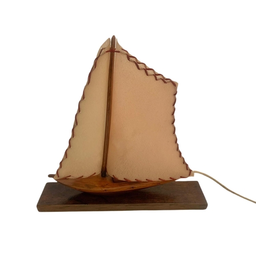 223 - 1930/50’s vintage lamp in shape of a yacht. 43x41cm