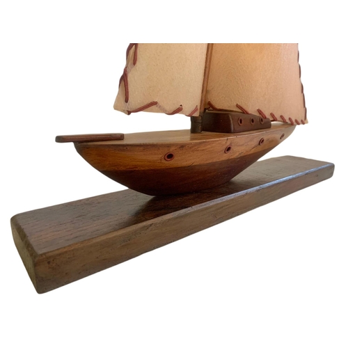 223 - 1930/50’s vintage lamp in shape of a yacht. 43x41cm