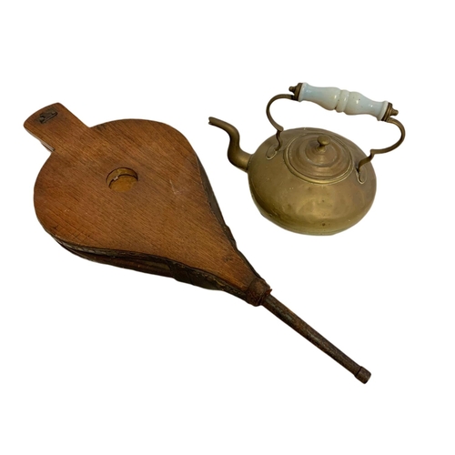 229 - Victorian brass kettle and a bellows. 61.5cm