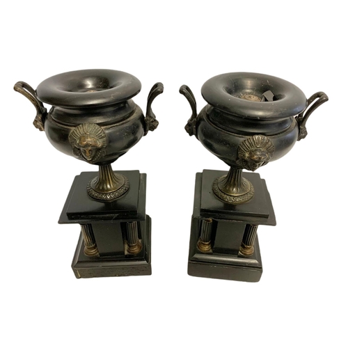 238 - Pair of Victorian slate urns with brass mounts. 26.5cm.