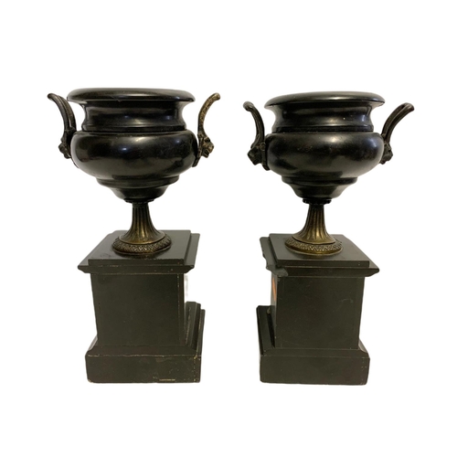 238 - Pair of Victorian slate urns with brass mounts. 26.5cm.