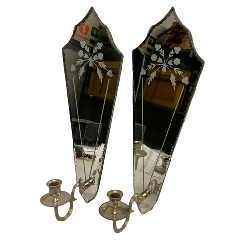 240 - Pair of mirrored wall sconces. Height 46cm