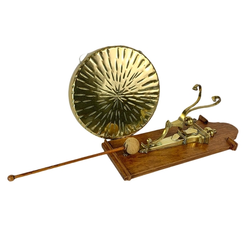 36 - Edwardian wall mounted brass gong. 42cm