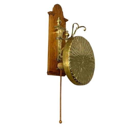 36 - Edwardian wall mounted brass gong. 42cm