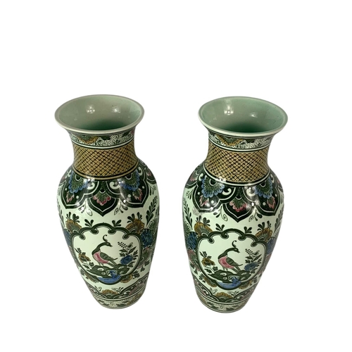 404 - Pair of German pottery vases by Villeroy & Boch. 24cm