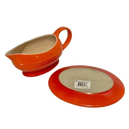 441 - Le Creuset pottery gravy boat. 22cm.