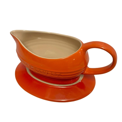 441 - Le Creuset pottery gravy boat. 22cm.