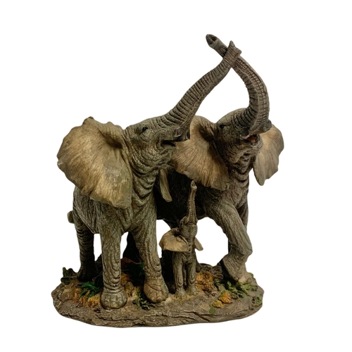 442 - 2 resin elephant figures. Largest 28cm