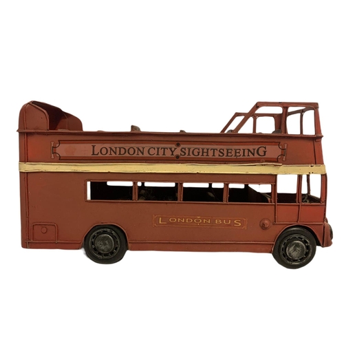 446 - Tin plate model “London City Sightseeing” bus. 32cm