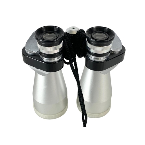 48 - Petlux binoculars in case. 16cm