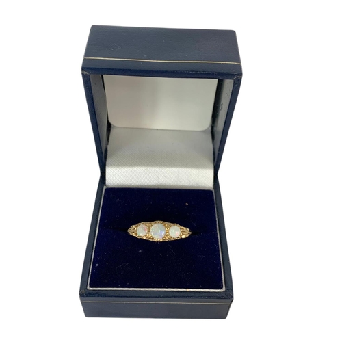 671 - 9ct gold Opal ring in case.