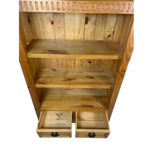 787 - Pine shelving unit with 2 drawers. 85/36.5/138cm