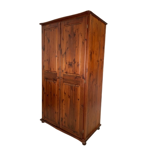 789 - Pine double door wardrobe.