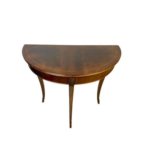 799 - 3 pieces of furniture. Including an inlaid mahogany hall moon hall table, a mahogany nest of 3 table... 