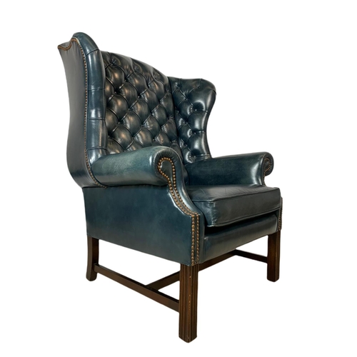 812 - Large Georgian style deep button leather wingback armchairs. 82x73x114cm