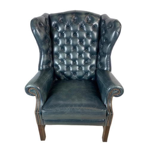 812 - Large Georgian style deep button leather wingback armchairs. 82x73x114cm