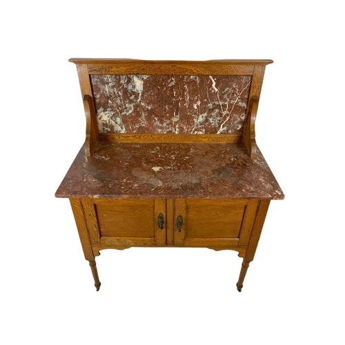 813 - Edwardian oak marble top washstand. 92x46x119cm.