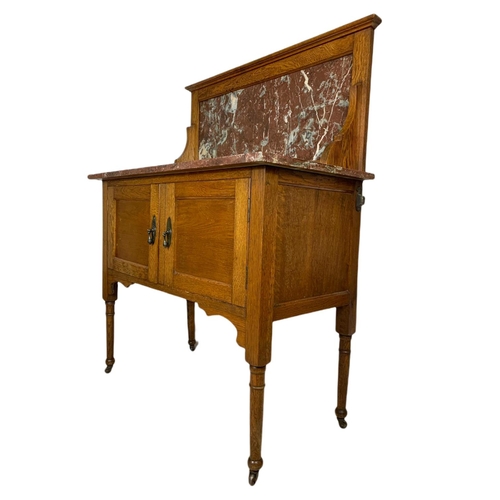 813 - Edwardian oak marble top washstand. 92x46x119cm.