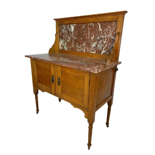 813 - Edwardian oak marble top washstand. 92x46x119cm.