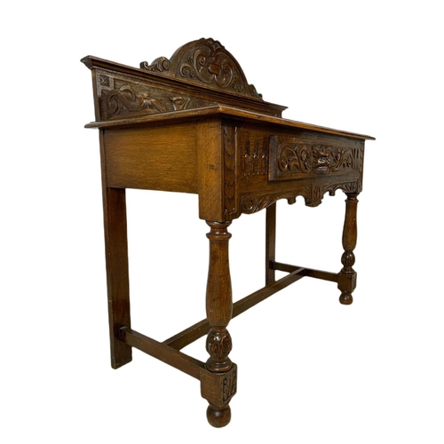 814 - Victorian carved oak console table with Man Of The Forest handle, 97x48x119.5cm