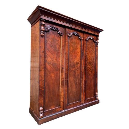 828 - Large Victorian carved mahogany 3 door wardrobe. 189x61x225cm