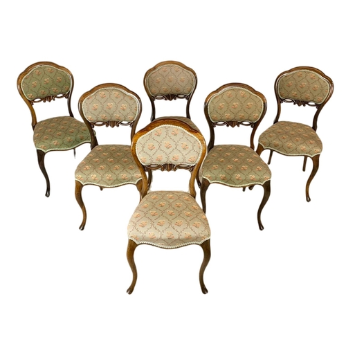 830 - Set of 6 Victorian rosewood balloon back chairs.