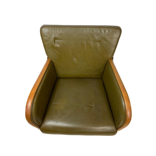 832 - Vintage leather and beech lounge armchair