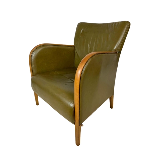 832 - Vintage leather and beech lounge armchair