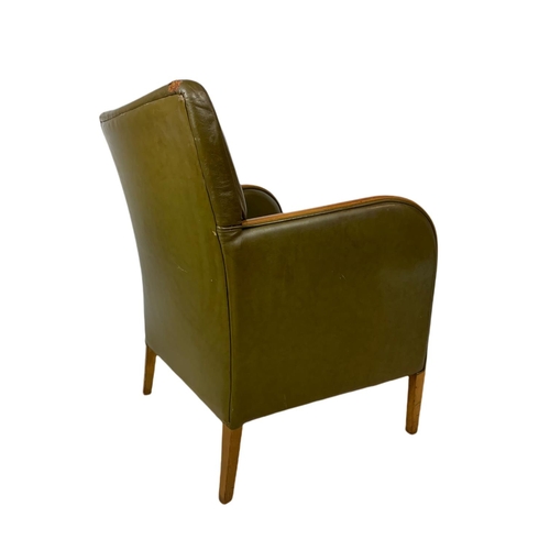 832 - Vintage leather and beech lounge armchair