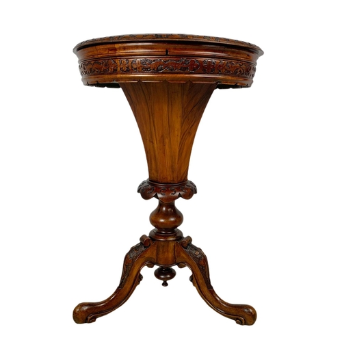 840 - Victorian carved walnut sewing table. 51x51x73cm